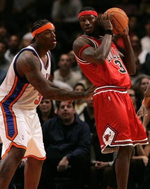 The headband wearing habits of former Bulls center Eddy Curry (left) have caused problems for Chicago's newest big man, Ben Wallace, who violated a team rule by donning one last weekend.