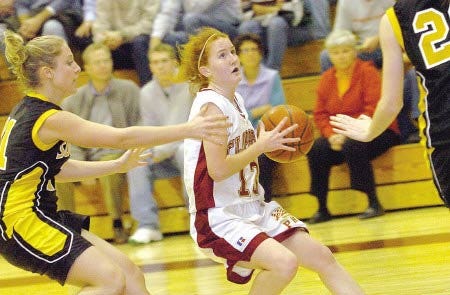 Portsmouth High School's Britt Conway (13) looks to go up for a shot during a game against Souhegan on Dec. 1. The Clippers, led by first-year coach Dan Casey, are adjusting to life in Class I this season after moving down from Class L.