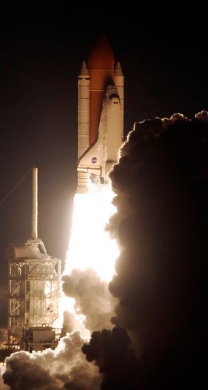 Space Shuttle Discovery lifts off from the Kennedy Space Center on Saturday.