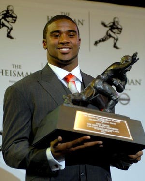 Paul Hawthorne/associated press Ohio State quarterback Troy Smith had his Heisman Trophy shipped Tuesday when airport security wouldn't let him take it on his plane.