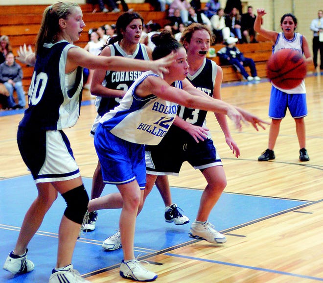 Holbrook’s Kristina Prusik looks to dish the ball to an open teammate during a game last week. Prusik is one of a handful of seniors who will be leading a young Bulldog squad this season.