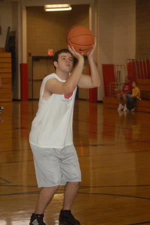 Justin Newton, a senior at Victory Christian School, is one of the basketball team's leading scorers.