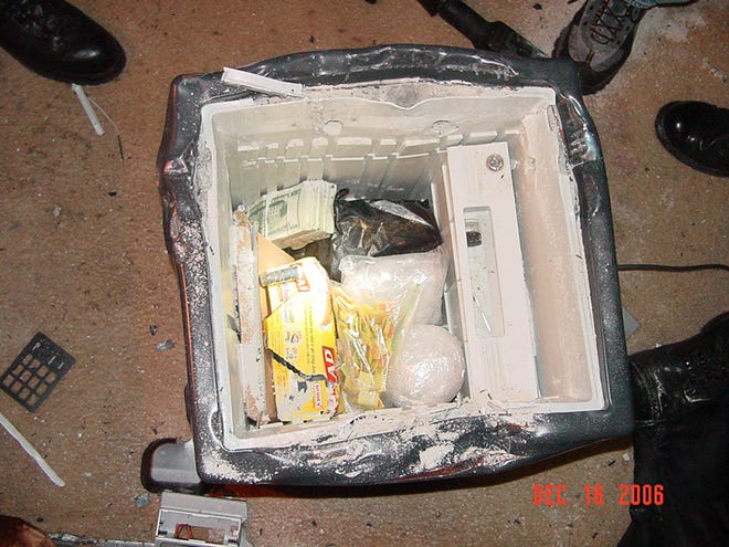 Police found drugs after busting open this safe.