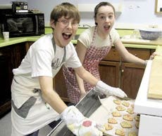 Hampton Academy students Chris Chao and Bridget Gillen bake cookies for care packages sent to U.S. troops overseas.
Courtesy photo