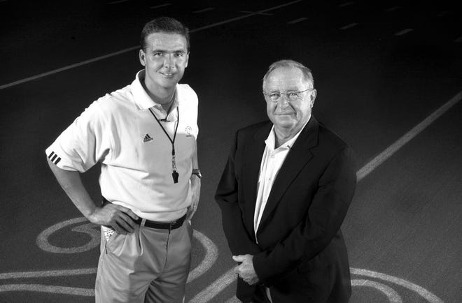 Urban Meyer, then coaching at Bowling Green, poses with legendary Ohio State coach Earle Bruce in this 2001 photo.