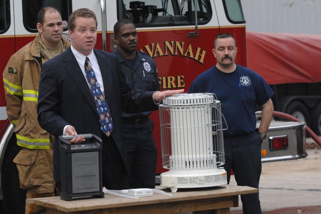 Georgia Insurance and Fire Safety Commissioner John Oxendine talks about safe use of space heaters Thursday evening at the Savannah Fire and Emergency Services Training Center on Sallie Mood Drive.