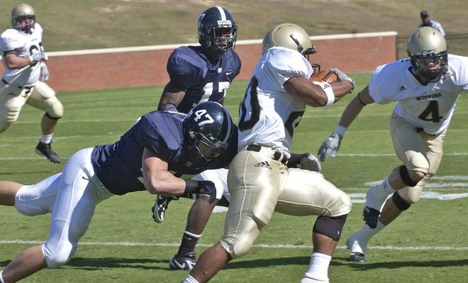 GSU linebacker John Mohring (47) reaches out for a Wofford runner during the teams' Nov. 4 game.