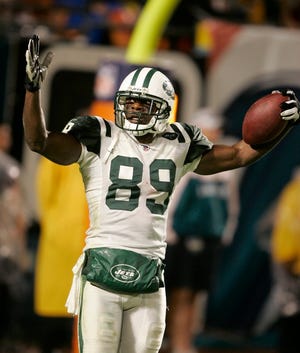 Jerricho Cotchery celebrates a New York TD during the Jets' 13-10 victory over Miami on Monday night.