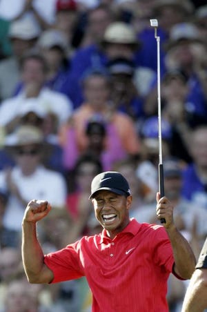 Tiger Woods celebrated after wrapping up his win in the 88th PGA Championship in August at Medinah Country Club.