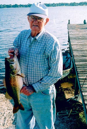 Elza "Red'' Furbee of Winter Haven was fishing for shellcracker on Lake Jessie with his son, Walter, on Dec. 29 when this estimated 9-pound bass gulped a cricket. Furbee, 96, released his biggest bass.