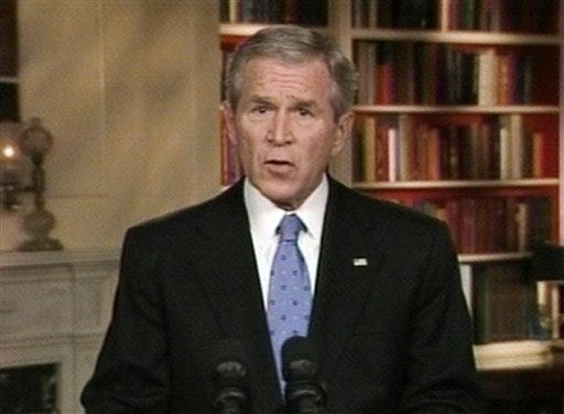 In this video frame grab taken from television, President Bush addresses the nation Wednesday from the White House library in Washington.