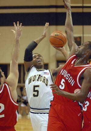 Wofford's Shane Nichols, center, scored 15 points in the Terriers' 83-78 loss to Davidson.