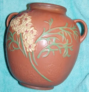 This "Roseville" vase turned out to be a reproduction.