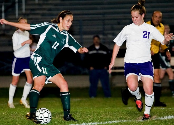 Forest's Diana Williams (11) scored the winning goal.