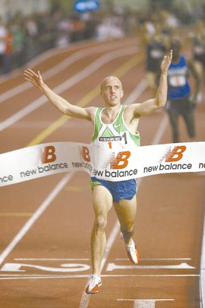 Alan Webb breaks the tape, winning the mile in 3 minutes, 56.70 seconds at the New Balance Games on Saturday in New York. Webb set a personal best indoors time on the sixth anniversary of his landmark run. In 2001, as a senior from South Lakes High School in Reston, Va., Webb became the first American prep runner to break the 4-minute mark for the indoor mile at the New Balance Games.