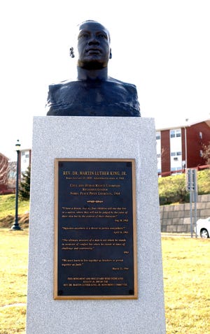 The unveiling of the Rev. Dr. Martin Luther King, Jr. bronze bust created by Beacon sculptor David Frech at Rev. Dr. Martin Luther King Boulevard and Colden Street in Newburgh yesterday.