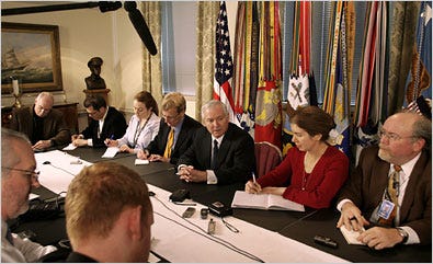 Defense Secretary Robert M. Gates, third from right, spoke about Iraq strategy to members of the news media at the Pentagon.