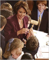 Nancy Pelosi assuming power, attended by assorted children.