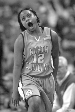 North Carolina's Ivory Latta reacts after hitting a three point shot during the second half of her college basketball game against Maryland Sunday. Latta scored 32 points in the 84-71 win.
