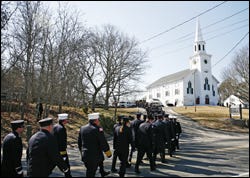 Approximately 200 firefighters from across the Cape and as far away as Manchester, N.H., walk to the First Congregational Church of Yarmouth yesterday for a service celebrating the life of Yarmouth Deputy Chief Peter Raiskio, who died of lung cancer last Wednesday.