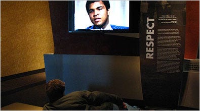 Muhammad Ali discusses race relations in a video displayed at his namesake museum in Louisville.