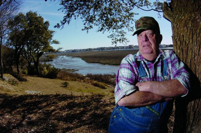 Staff Photo | JEFFREY S. OTTO
Jim Culpepper, a retiree who owns three acres on the water in Ocean Isle Beach, doesn’t know whether he will be able to afford his taxes soon. ‘I don’t want to leave, but it looks like we’re going to be forced out.’