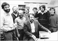 Karlheinz Brandenburg, seated, in 1987 with the team he led that worked on audio compression technology. From left, Harald Popp, Stefan Krägeloh, Hartmut Schott, Bernhard Grill, Heinz Gerhäuser, Ernst Eberlein and Thomas Sporer.