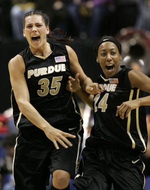 Purdue's Erin Lawless (left) and Lakisha Freeman celebrate after beating Ohio State in the Big Ten final.