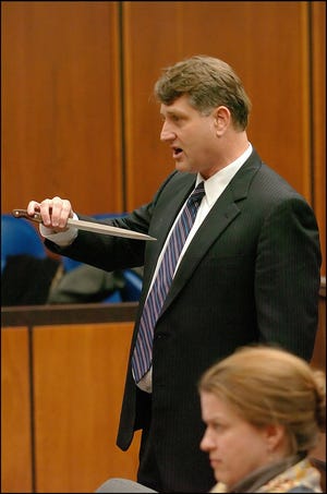 John Odgren is arraigned Tuesday afternoon at Middlesex Superior Court charged with killing fellow student James Alenson at Lincoln-Sudbury Regional High School in January.  Assistant district attorney Daniel Bennett describes the events leading up to the stabbing. This is not the knife used in the stabbing but similar according to Bennett.