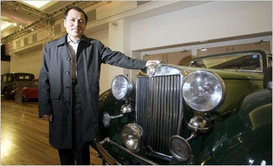 Wang Hongbiao, the chairman of Nanjing Automobile in the United Kingdom, with a classic MG at a factory in Longbridge, England.