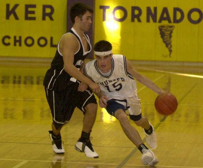 David Rodriguez dribbles around a Pendleton player during a 2004 game at Booker High.