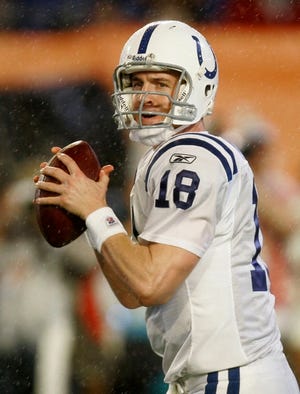 Colts quarterback Peyton Manning looks to pass against the Bears in the first quarter of Super Bowl XLI in Miami.