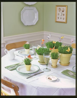 Martha Stewart says, a lovely green centerpiece brings the freshness of spring to the table.