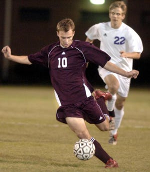 Lakeside's Tyler Bivens advances the ball ahead of a defender. The Musketeers had no shots on goal during the first half.