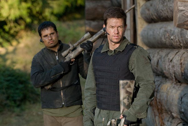 Michael Pea (left) and Mark Wahlberg (right) star in Shooter.