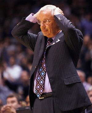 Roy Williams and the Tar Heels had an 11-point lead in the second half, but Georgetown rallied to force overtime and outscored North Carolina, 15-3, in the extra time.