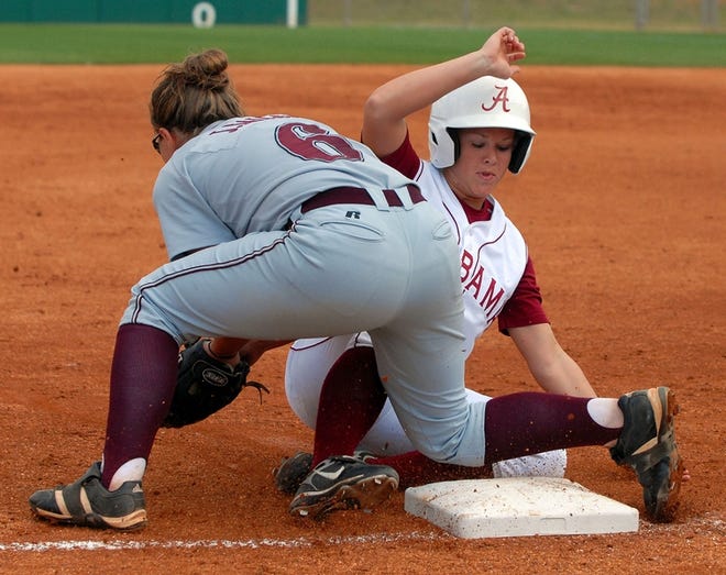 Alabama’s Mallory Benak slides safely into third base during the Tide’s game with Mississippi State on March 11. Benak has seven stolen bases and has scored 11 runs this season.