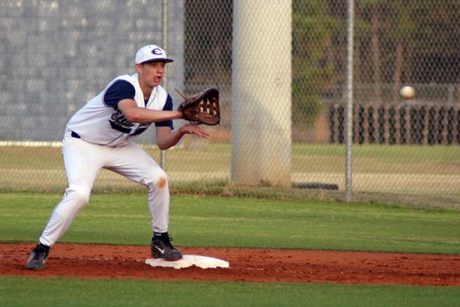 Zach Dotson of Effingham County makes an out at first during Tuesday's game at Rebel Field.