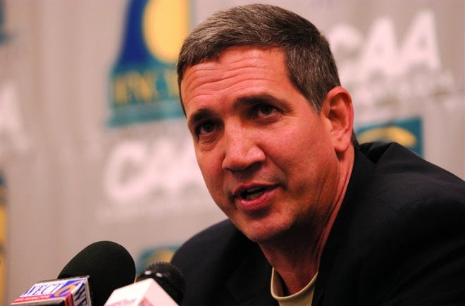 UNCW Athletic Director Mike Capaccio(cq) speaks to the media at a press conference regarding the resignation of men's basketball coach Brad Brownell in the Trask Coliseum Press Room Saturday, April 1, 2006. Photo by MATT BORN / WILMINGTON STAR-NEWS