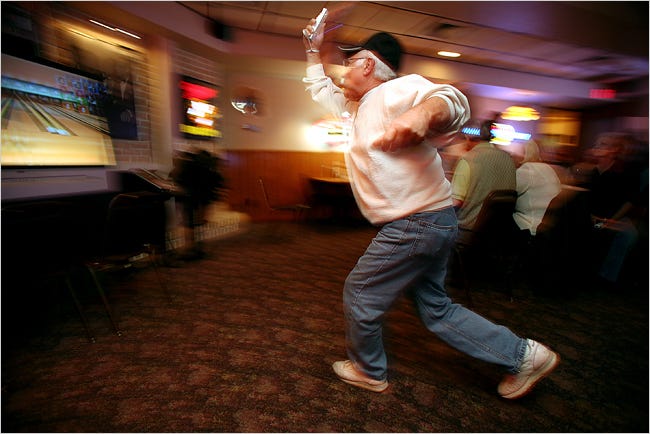 Victor LoBello, 63, competes in a Nintendo Wii bowling league at Giovan’s, a restaurant in Crest Hill, Ill.