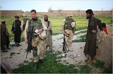 Dutch soldiers, who stress reconstruction over combat, with a member of the Afghan National Police recently in Qala-e-Surkh, Afghanistan.