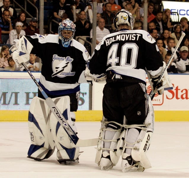 Tampa Bay goalies Johan Holmqvist (40) and Marc Denis will have their hands full when the seventh-seeded Lightning opens the NHL playoffs against the second-seeded New Jersey Devils.