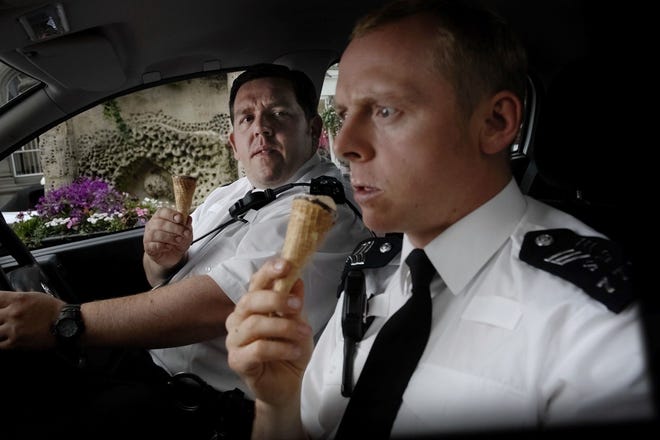 Cold ice cream, “Hot Fuzz,” starring Nick Frost, left, and Simon Pegg. The Associated Press