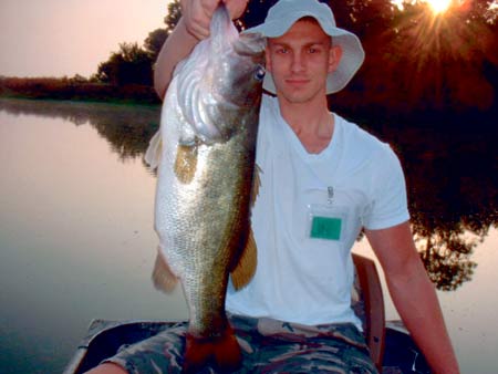 Matt Borden of Lakeland and his dad, Chuck Borden, haven boated a number of bass in lake Fish Hook at Tenoroc. Matt released this 7-pound, 1-ounce bass, a personal best, Saturday morning on a shiner.