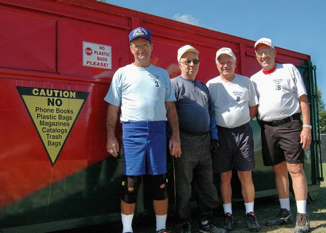 Bob Owens, Carmen DiCocco, Angelo Licata, and Ken Dickerson, officers of the Spruce Creek South softball league, were instrumental in having this recycling container placed at the retirement community.