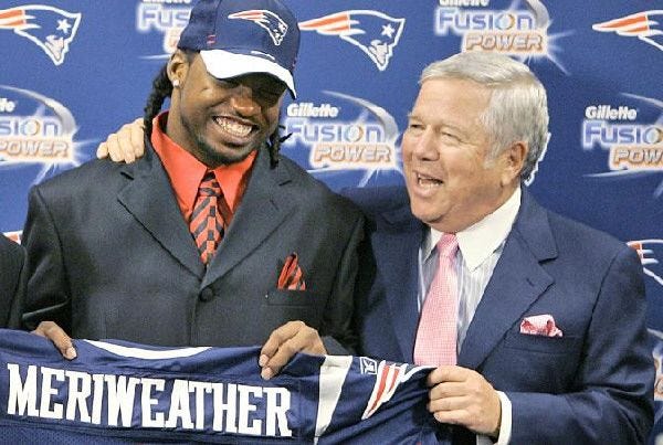 Patriots owner Robert Kraft, right, and first-round draft pick Brandon Meriweather share a laugh at Gillette Stadium on Friday.