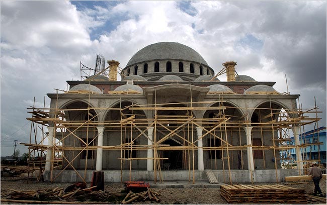 Factories in Konya’s industrial districts often build mosques for their workers. This one is under construction for a company called Molinos.