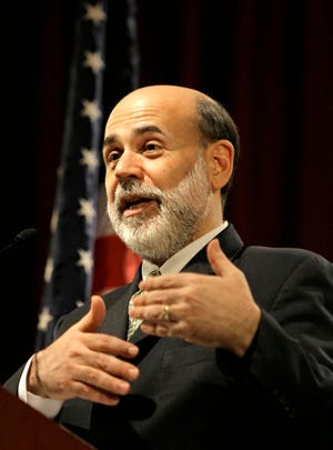 **FILE** Federal Reserve chairman Ben Bernanke, gestures as he answers students' questions at New York University's law school and it's Global Economic Policy Forum in New York, in this April 11, 2007 file photo. Federal Reserve Chairman Ben Bernanke said Thursday, May 17, 2007 that he did not believe the growing number of mortgage defaults would seriously harm the economy. (AP Photo/Kathy Willens, file)
