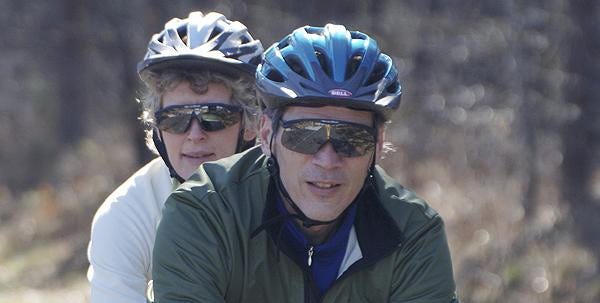 Cathy and Gary Pastva, shown on a recent training ride on the Cape Cod Rail Trail, plan to pedal their tandem 25 to 75 miles a day on their year long trek. 
-