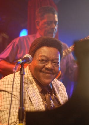 Fats Domino performs before a sold-out crowd at Timitina's nightclub in New Orleans Saturday.